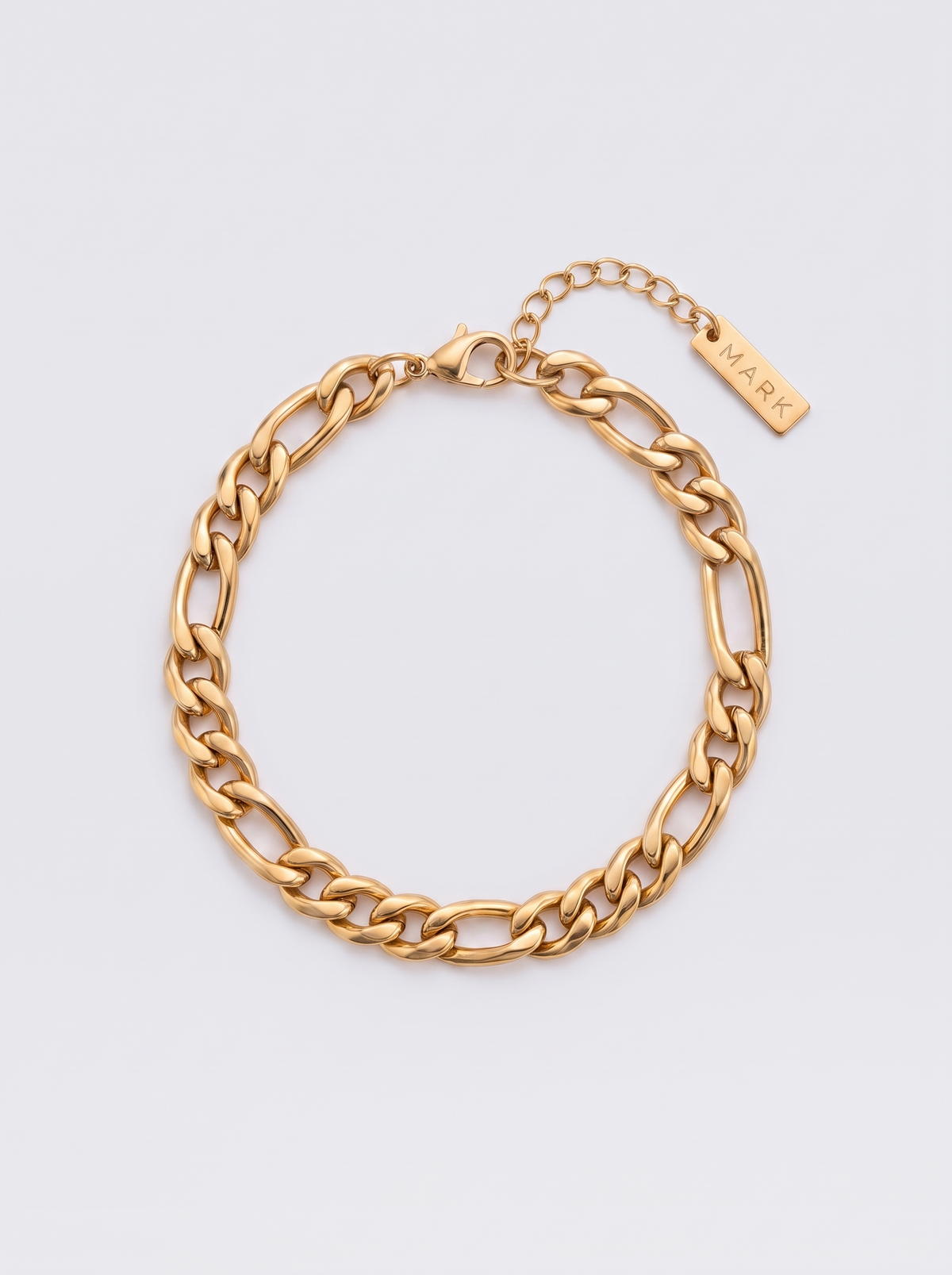 Gold Figaro bracelet on its own