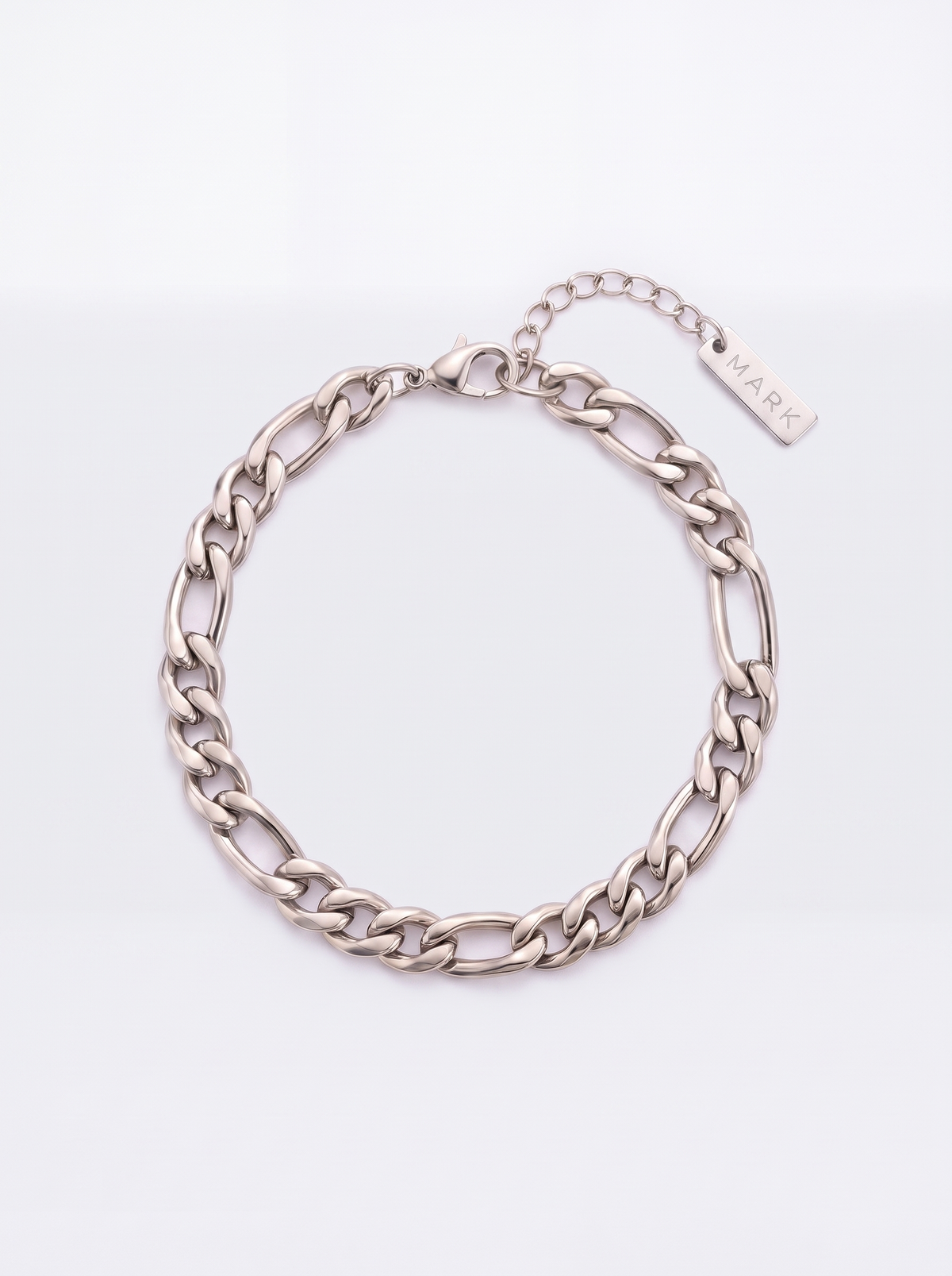 Silver 6.5mm Figaro bracelet with MARK tag