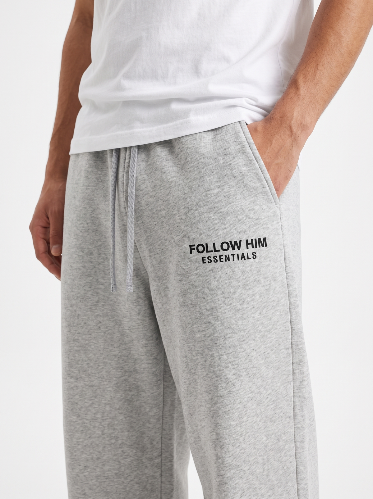 Gray sweatpants thigh logo close-up