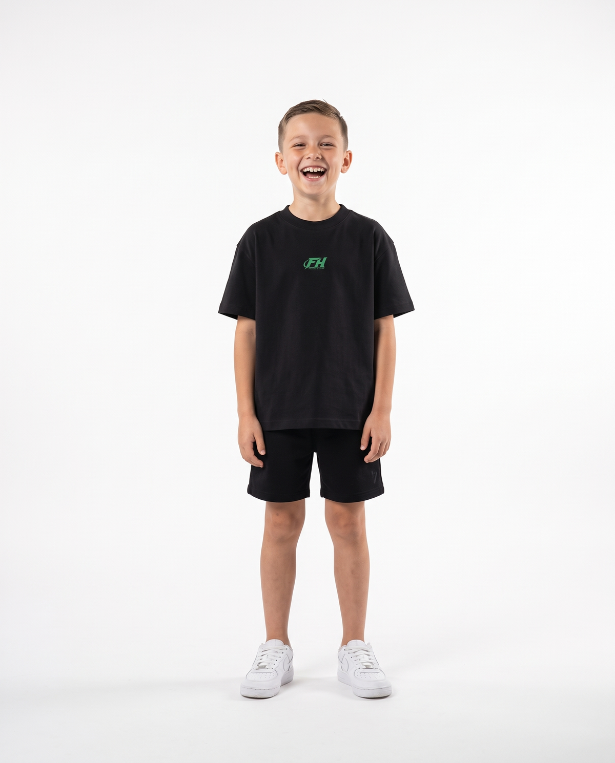 Kid wearing the Youth DOOMED Follow Jesus Tee, front