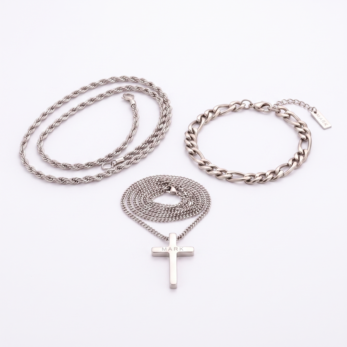 The complete set in silver — cross necklace, rope chain and Figaro bracelet